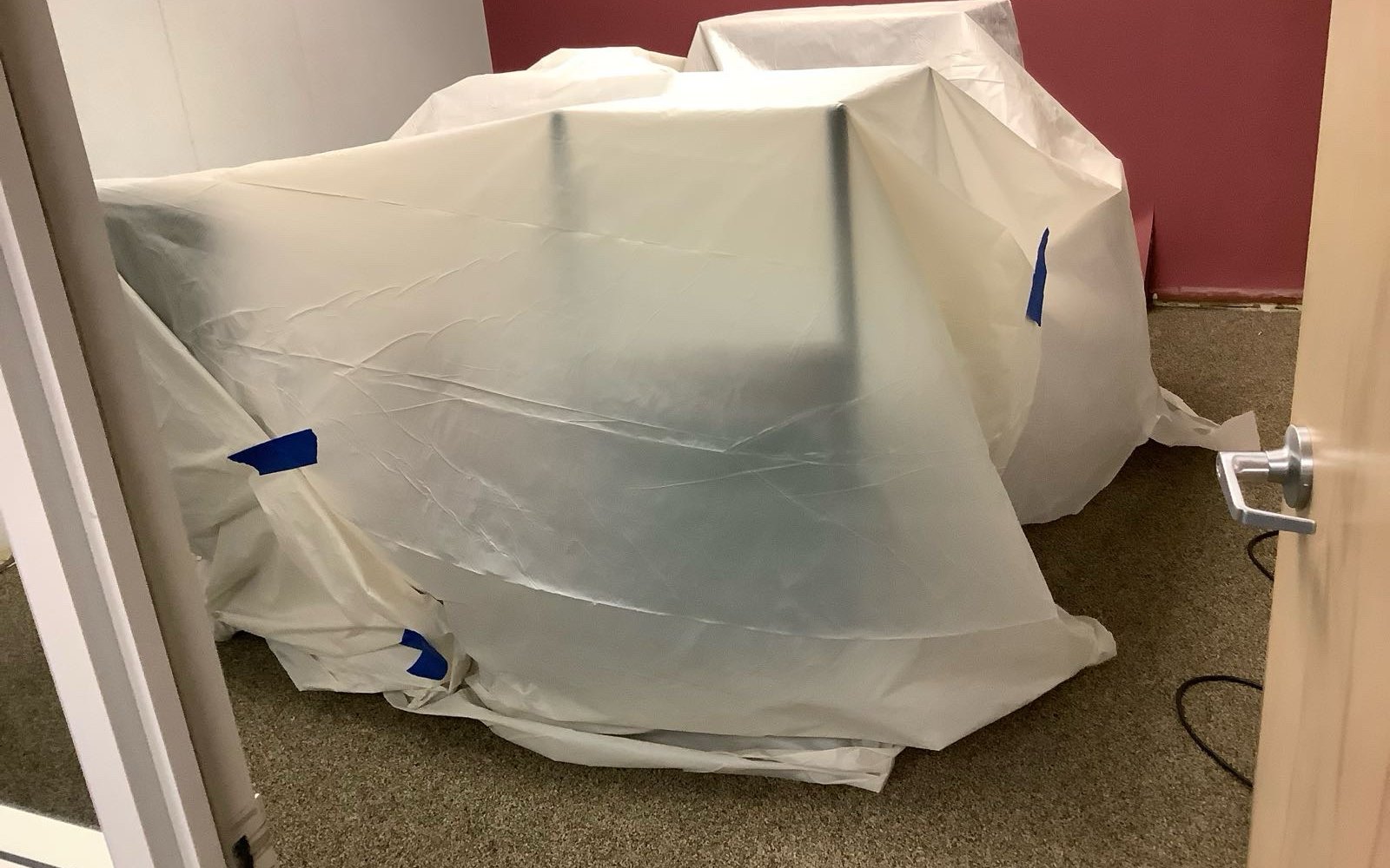 Protected office area prepared for controlled remediation