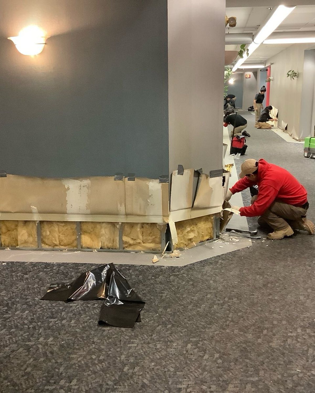 Commercial lower walls opened during property damage restoration